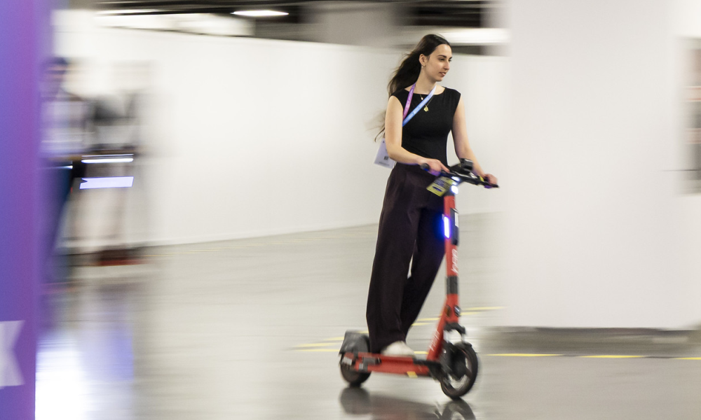 Image of a delegate trying an e-scooter on the test-track