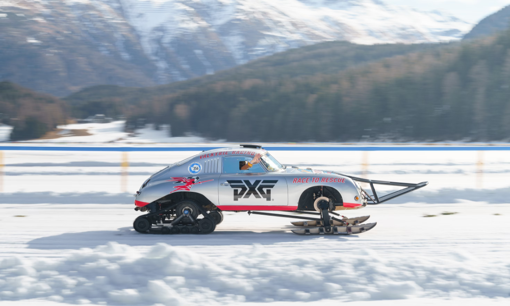 Picture of an old Porsche car which has been converted for use on snow