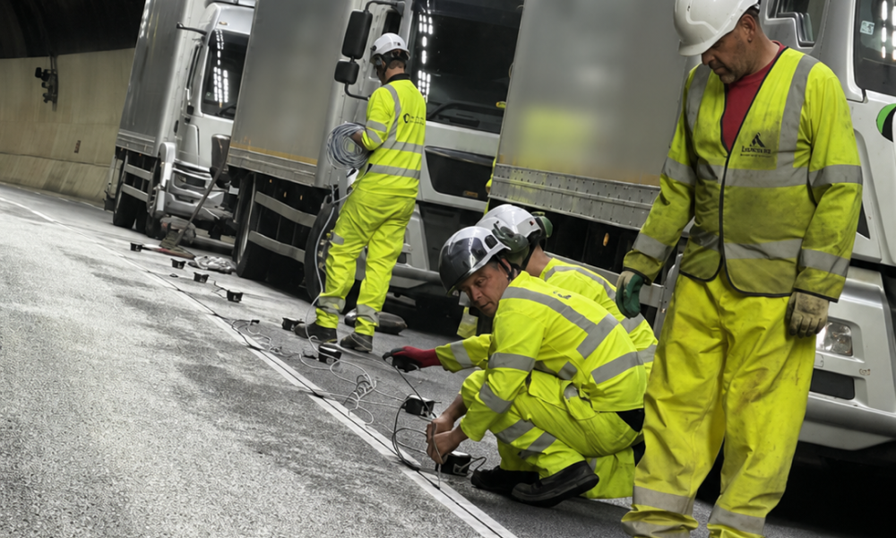 An image of Clearview's Intelligent Road Studs being installed in the A3 Hindhead Tunnel, UK. 