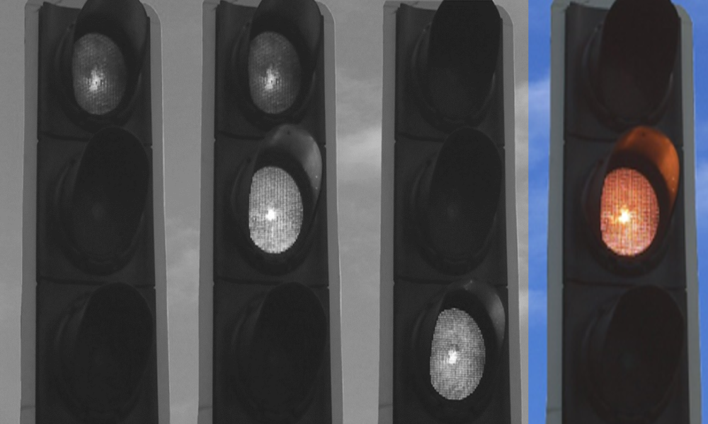 Image of the traffic signal illuminating the Leaving Amber display