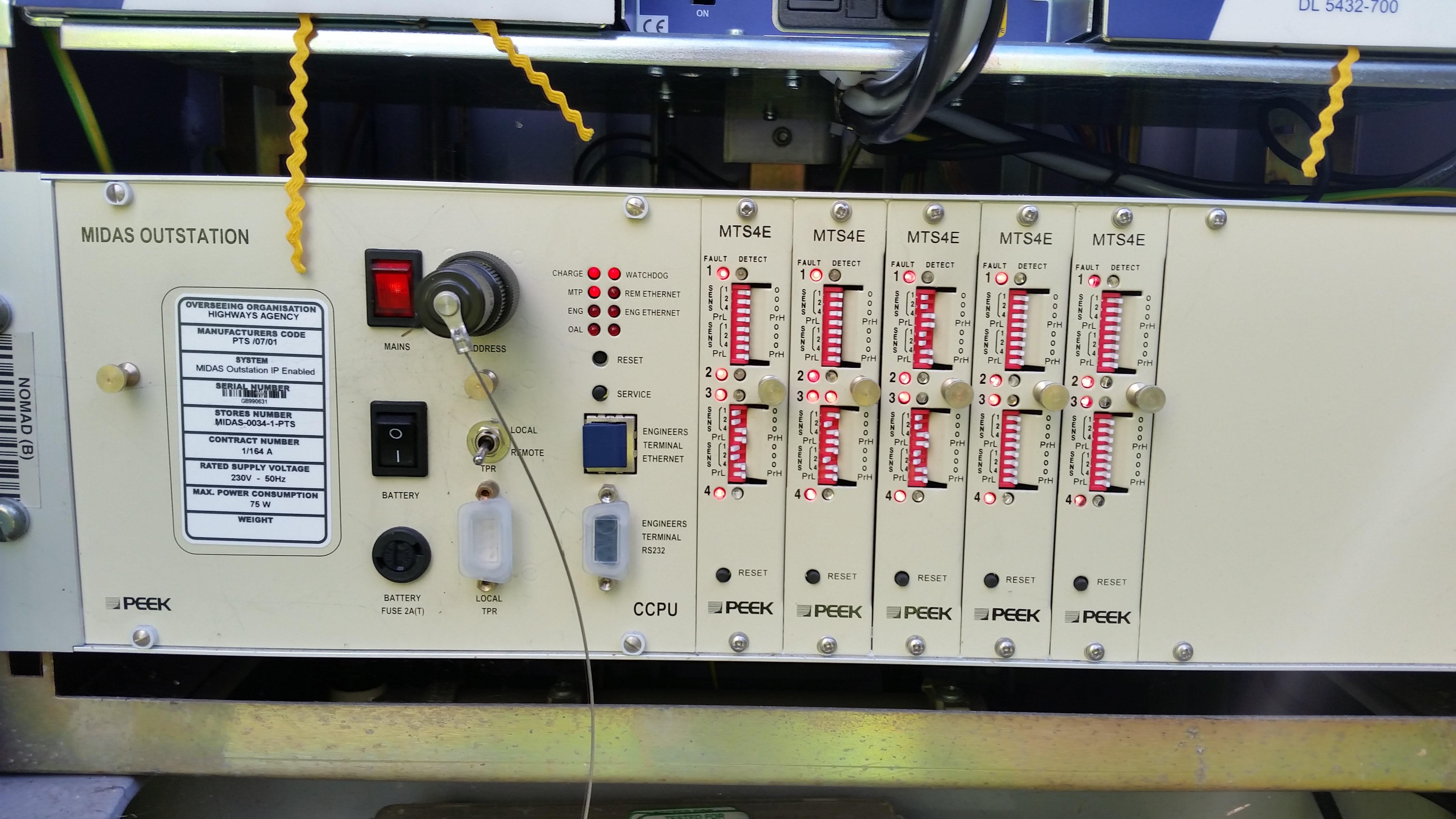 Image of inductive vehicle detector loop packs mounted within a roadside cabinet